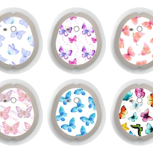 Puede incluir: Seis diseños diferentes de parches adhesivos con estampado de mariposas de colores para un dispositivo médico.