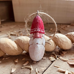 Hand carved wooden Santa ornament
