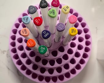 Couture Creations Twin Tip Marker holder! Holds 96!  Off brand triangle shaped markers work too! Great for artists! Pick a color, turntable!