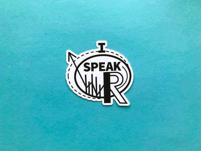 May include: A white sticker with black text and graphics on a teal background. The sticker says "I SPEAK WR" in a stylized font, surrounded by a dotted circle and arrow design.