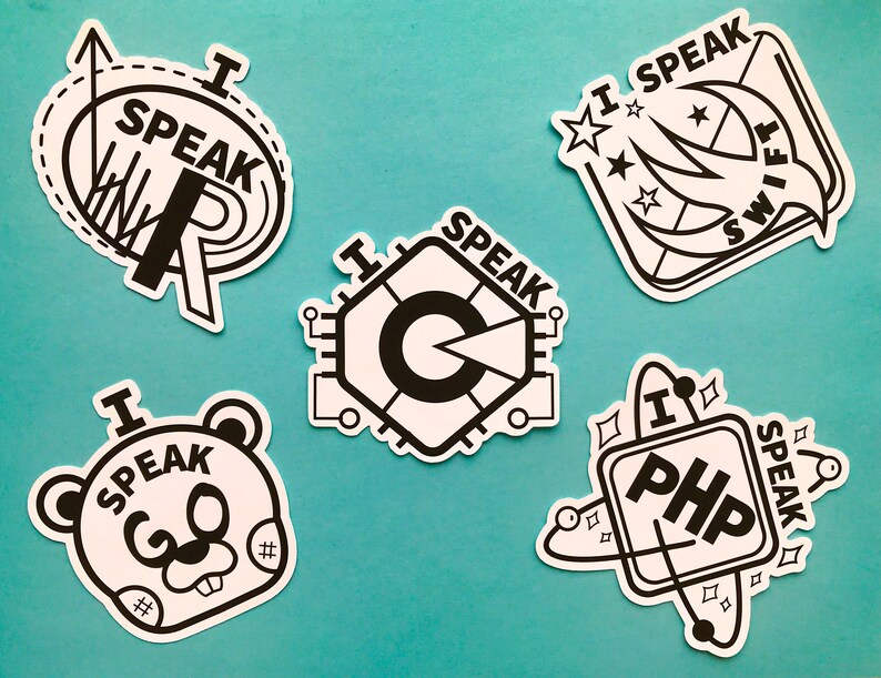 May include: A selection of white stickers with black outlines. Each sticker features the words "I SPEAK" and a programming language or symbol, such as R, C, Swift, PHP, and a bear-like character.