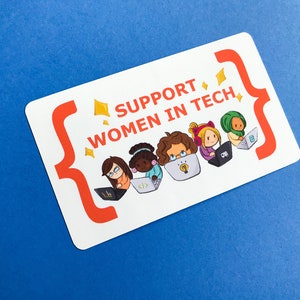 May include: A rectangular card with the text "SUPPORT WOMEN IN TECH" and illustrations of women working on laptops. The card has a white background with orange brackets and is set against a blue backdrop.