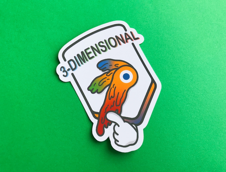 May include: A white sticker with the text "3-DIMENSIONAL" in rainbow colors. The sticker features a cartoon eye with orange, yellow, and blue details, and a white hand pointing at the eye. The sticker is on a green background.