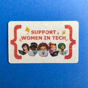 May include: A rectangular sticker with the text "SUPPORT WOMEN IN TECH" and illustrations of five diverse women working on laptops. The sticker has a red bracket design and is set against a blue background.