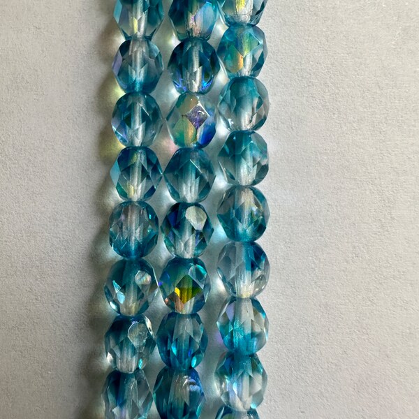 Bead, Czech fire-polished glass, two-tone, translucent crystal and aqua AB, 6mm faceted round