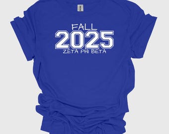 2025年秋 ゼータ・ファイ・ベータ ユニセックス プレッジング・クロッシング・モメント ソフトスタイル Tシャツ、ゼータ・ファイ・ベータ、1920年
