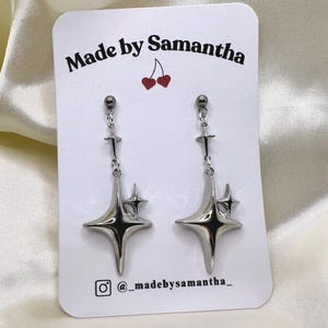 Dangly Silver Star Earrings: Retro Sparkle, Stainless Steel Posts