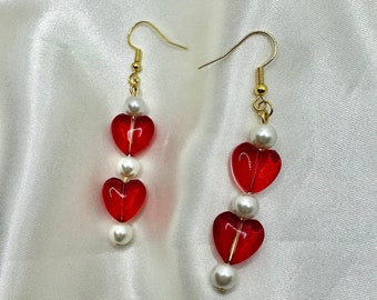 Dangly red heart and pearl bead earrings in gold