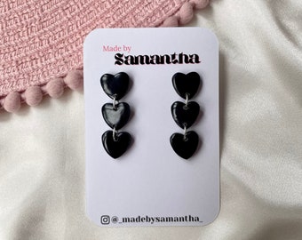 Black polymer clay three-tier dangly heart earrings | Valentine's earrings