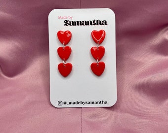 Bright red polymer clay three-tier dangly heart earrings | Valentine's earrings