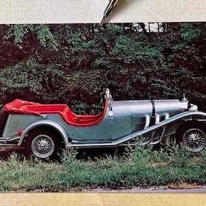 The Excalibur SS Postcard Vintage Car