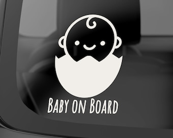 May include: White vinyl sticker with a cartoon baby in an egg and the text "BABY ON BOARD".