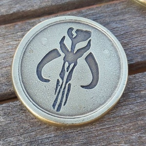 the mandalorian coins