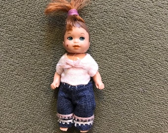 barbie with brown hair and green eyes