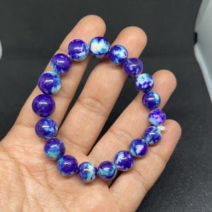 Pink Purple Sugilite Bead Bracelet: Natural Gemstone, 163.Ct