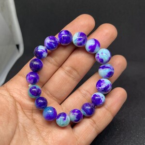 Pink Purple Sugilite Bracelet: Natural Gemstone Beads (12-10 MM, 148 Ct.)