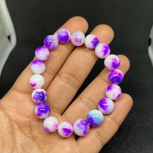 Pink Purple Sugilite Bead Bracelet: Natural Gemstone, 158.Ct