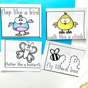May include: Four printable cards with black and white illustrations of a bird, chick, butterfly, and bee. The cards have instructions to "flap like a bird", "walk like a chick", "flutter like a butterfly", and "fly like a bee".