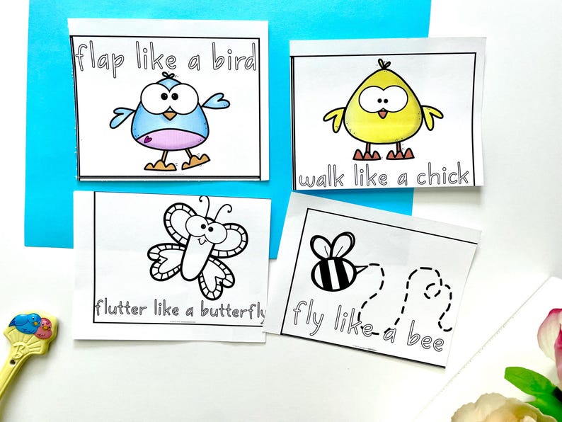 May include: Four printable cards with black and white illustrations of a bird, chick, butterfly, and bee. The cards have instructions to "flap like a bird", "walk like a chick", "flutter like a butterfly", and "fly like a bee".