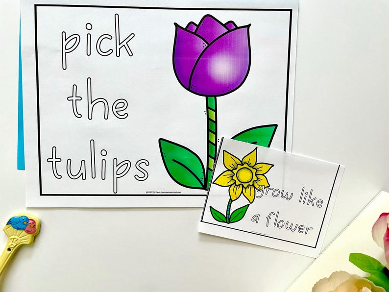 May include: A printable activity for kids featuring a purple tulip with green leaves and the text "pick the tulips". A separate card with a yellow flower and the text "grow like a flower" is also included.