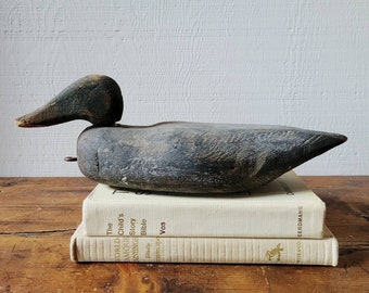 Vintage gray duck decoy.