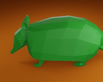 Puede incluir: Un modelo 3D de armadillo verde de baja poli. El armadillo está mirando hacia la izquierda y tiene una cola larga.