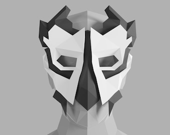 May include: A white and black geometric mask with a triangular design. The mask has two eye holes and a pointed nose.