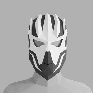 May include: A white and black geometric mask with a sharp, angular design. The mask has a pointed top and a narrow chin. The eyes are covered with black and white geometric shapes.