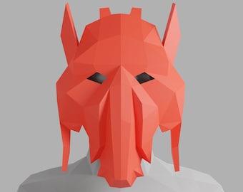 May include: A red origami mask with a pointed nose and large ears. The mask is made of paper and has a geometric design.
