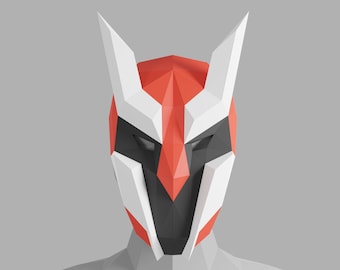May include: A white and red origami mask with black eye holes and a pointed nose. The mask is made of paper and has a geometric design.