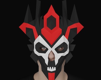 May include: A black and red papercraft mask with a skull design. The mask has a sharp, angular shape with a pointed crown and a white skull face with black eyes.