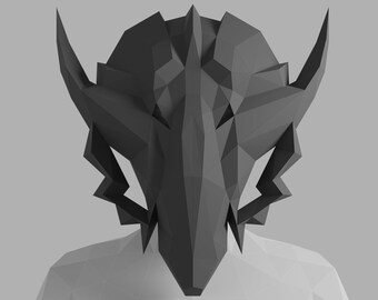 May include: A black, geometric, origami-style mask with sharp angles and a pointed beak.