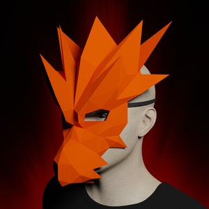 May include: A bright orange paper mask with a geometric design resembling a dragon's head. The mask is worn by a person, covering their eyes and nose.