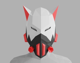 May include: A white, red and black origami mask with a geometric design. The mask has a pointed top and two ears.