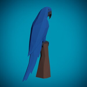 May include: A blue and brown origami parrot perched on a branch. The parrot is facing to the right and has a long tail.