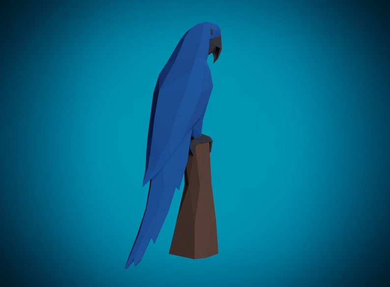 May include: A blue and brown origami parrot perched on a branch. The parrot is facing to the right and has a long tail.