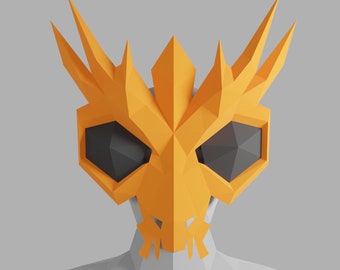 May include: A bright orange, geometric, papercraft mask with sharp, pointed edges and black eyes. The mask is designed to look like a skull with a jagged, spiky crown.