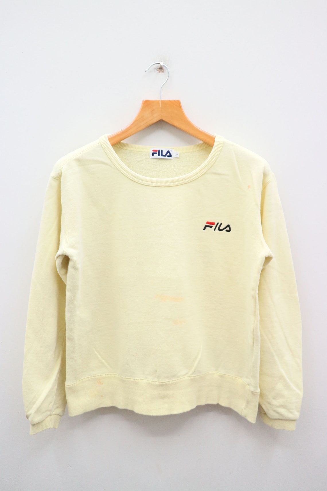 yellow fila jumper