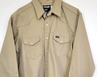 Vintage Wrangler USA made western pearl snap heavy stiff canvas work ranch shirt! Tan, tag size 17-35, x long tails, unworn condition.