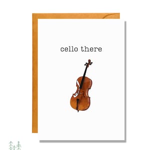 May include: A white greeting card with the text "cello there" in black font. A brown cello is illustrated below the text.