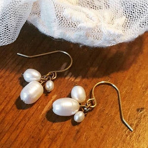 Fresh water pearls on raw brass hooks