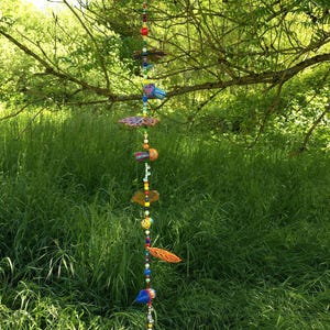 Mobile made of painted wood and beads/wind chime/autumn decoration