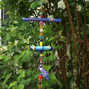 Mobile made of painted branches/wood scraps and beads/wind chimes/blue tones