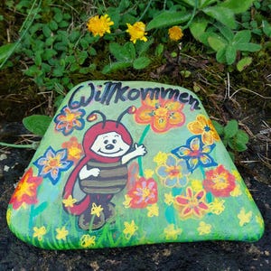 Painted stone with ladybug/gift/welcome/decoration