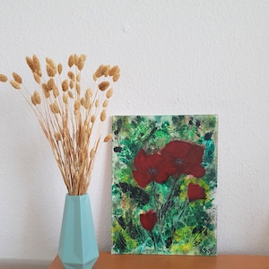 Panel de lienzo con amapolas, pintado con técnica acrílica.