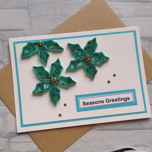 Papier art poinsettia carte de voeux de Noël, beaux poinsettias en papier, carte élégante pour Noël