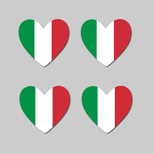 May include: Four heart-shaped stickers displaying the Italian flag. Each heart has a vertical tricolour design of green, white, and red. The stickers are set against a grey background.