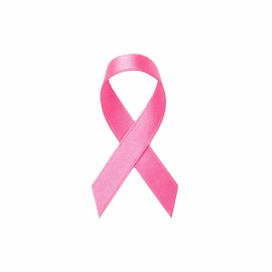 May include: A pink ribbon, a symbol of breast cancer awareness.