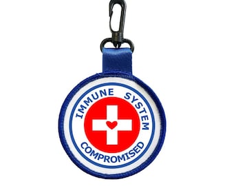 Llavero con etiqueta de alerta médica con sistema inmunitario comprometido