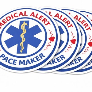 May include: A collection of round medical alert stickers. Each sticker features a blue star of life symbol with a gold caduceus, red heart, and the words "MEDICAL ALERT" and "PACE MAKER" in a blue and white design.